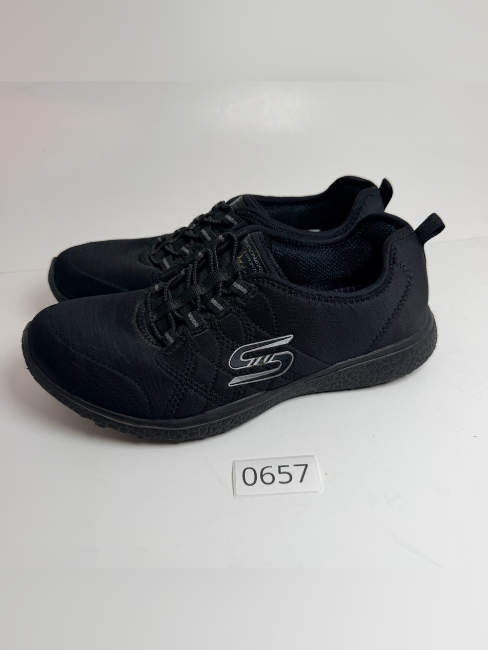 Skechers Women's Black Athletic Slip-On Sneakers with Silver Logo